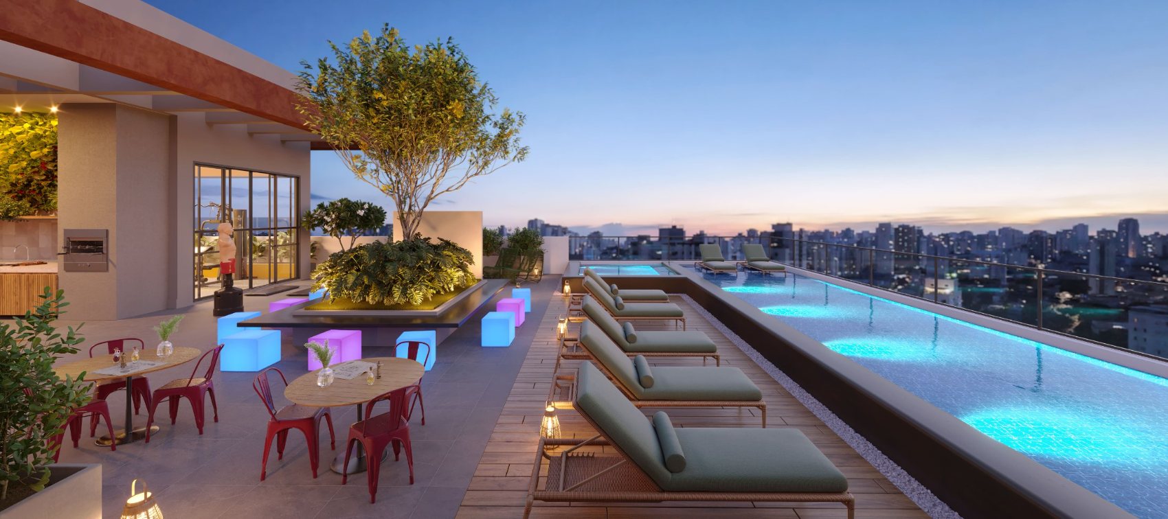 Piscina de borda infinita no rooftop do MOVE Tucuruvi com vista do skyline ao entardecer