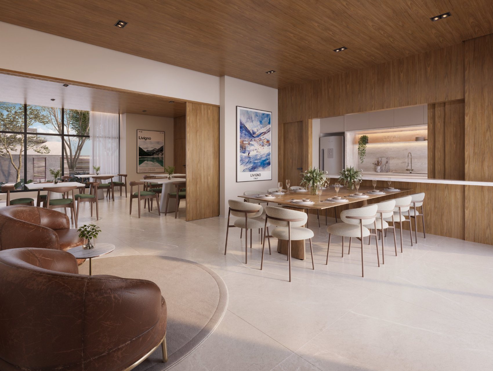 Espaço gourmet e lounge do Livigno, com marcenaria em madeira, mesa comunitária e poltronas de couro