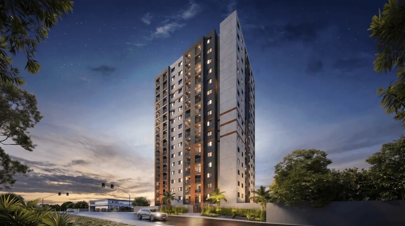 Torre residencial da Open Group ao anoitecer